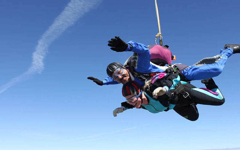 Woman doing a tandem skydive